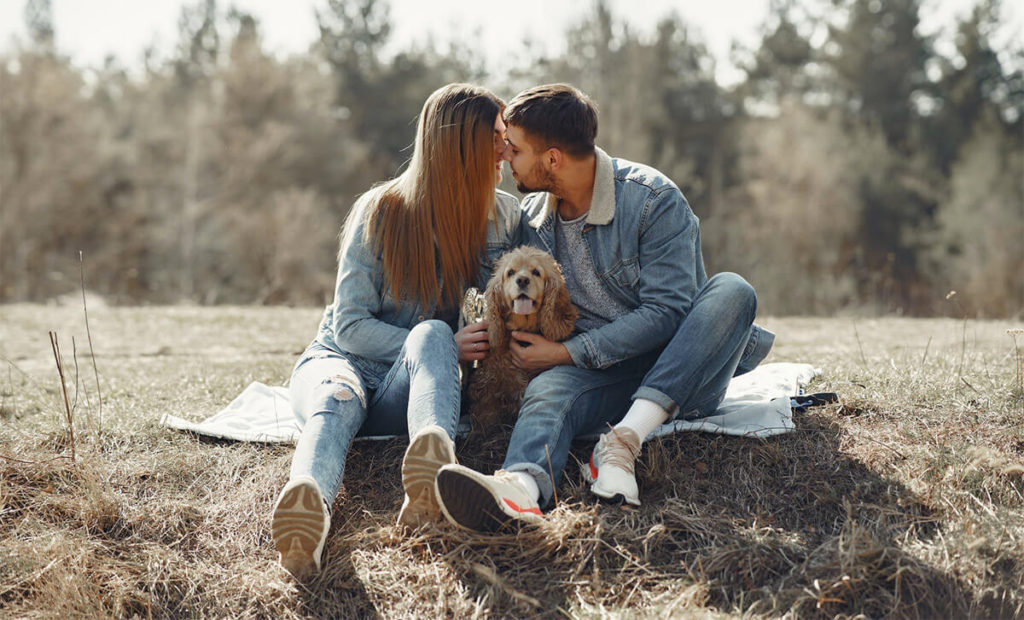 all denim couple shot with dog